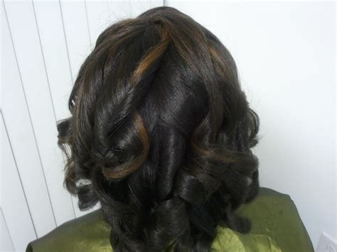 The velvet rope salon studio provides excellent customer service, skilled professional stylists, in an atmosphere designed for networking and community. Chicago's Premier Natural Hair Salon | Rachel O. Beauty