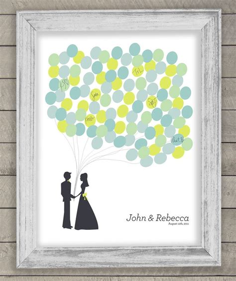 This is a meaningful guestbook that can be framed as wall art after the wedding. new ideas for wedding guest book alternatives | OneWed.com