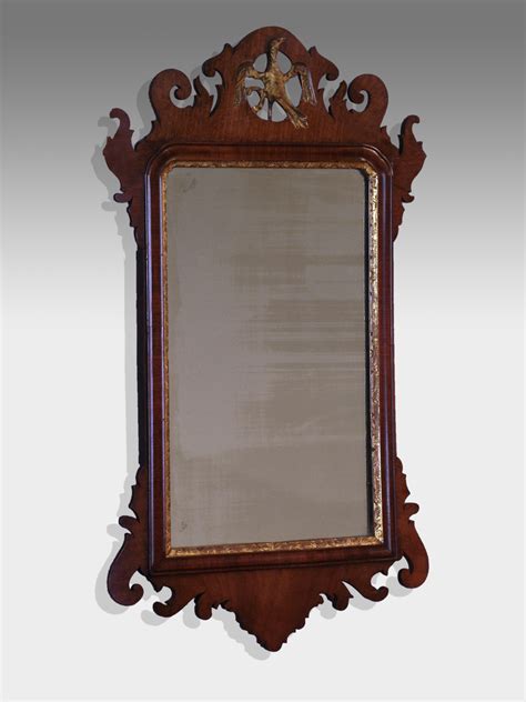 This floral and antique work done on the frame does make it. Mirror Wall, Old Mirrors In Wood Frames Antique Wood Wall ...