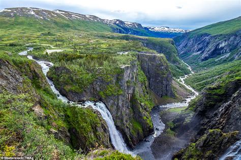 Step Bridge Spans Gorge Above Norways Voringsfossen Waterfall