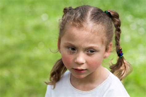 The Emotions Of A Beautiful Expressive Five Year Old Girl Stock Photo