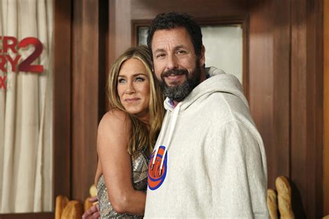 adam sandler sends a bouquet of flowers to his friend jennifer aniston every mother s day omg