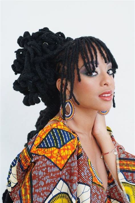 The words curly fringe immediately call to mind bad '80s perms and hilarious jazzercise videos. Curly bun With fringe braid | Locs hairstyles