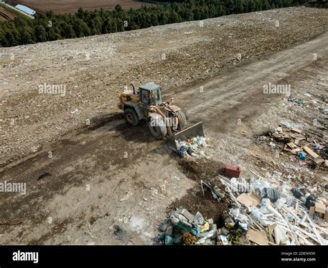 Top Drone View Of Dump Different Types Of Garbage Tractor Carries