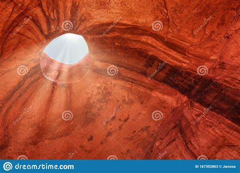 Hole In The Roof Of A Spiritual Cave In The Navajo Tribal Park Of