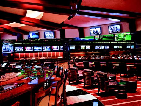 Toy football gates, ball and betting lists on green grass, sports betting concept. Sports Betting in Las Vegas