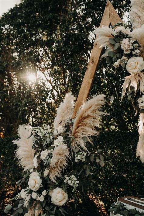 Tropical Boho Wedding With A Pampas Grass Arch And Muted Greens ⋆ Ruffled