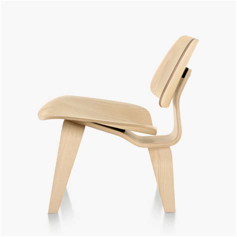 The eames lounge chair wood (lcw) (also known as low chair wood or eames plywood lounge chair) is a low seated easy chair designed by husband and wife team charles and ray eames. Eames Molded Plywood Lounge Chair with Wood Base by ...