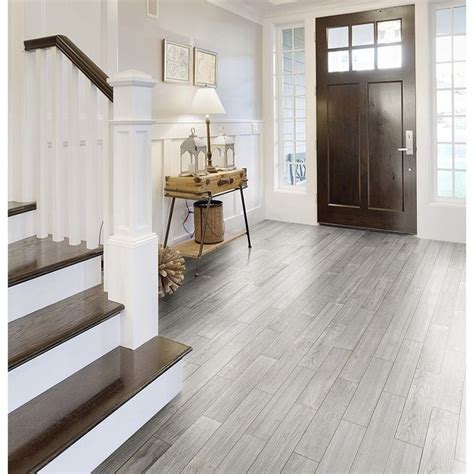 When you step on it, you'll feel. Style Selections Eldon White Wood Look Porcelain Floor ...