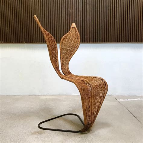 This series is available as chair, stackable chair, lounge. Italian Sculptural Leaf-Shaped Wicker & Steel Rod ...