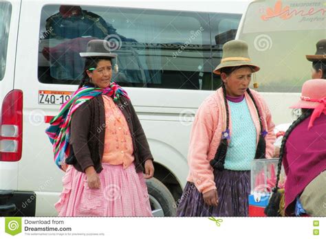 Traditional Quechua Woman On Modern City Street In La Paz Editorial