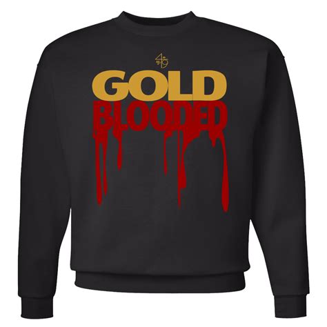 It is split into two lines: Turnstyle — GOLD BLOODED CREWNECK