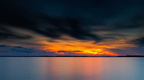 Beautiful Sunset Black Yellow Clouds Blue Sky Background 4k 5k Hd