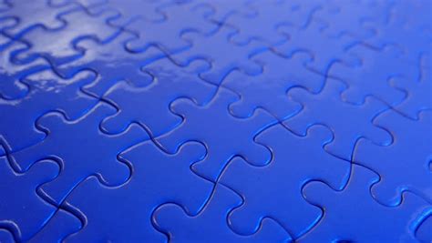Jigsaw Puzzle. Slowly Turn Background. Stock Footage Video (100% Royalty-free) 13670918 
