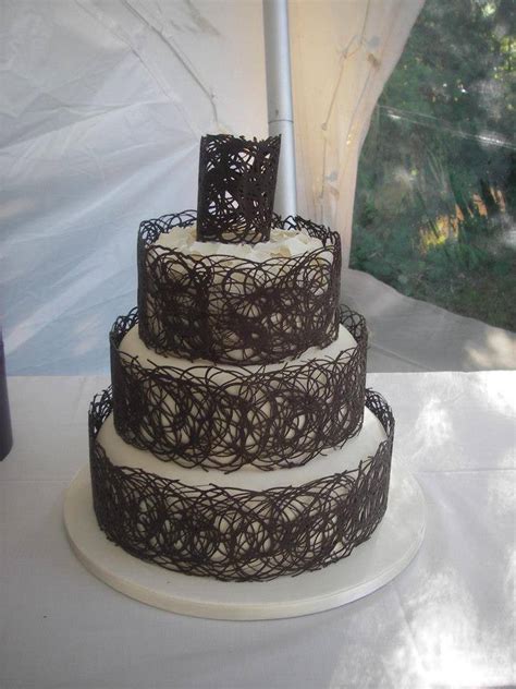 My favorite way to make chocolate frosting on chocolate cake feel special is to use a different type of chocolate for the frosting — like milk chocolate frosting on a dark chocolate cake — and top the whole thing with chocolate shavings Unusual Wedding Cakes and Unique Cakes For You