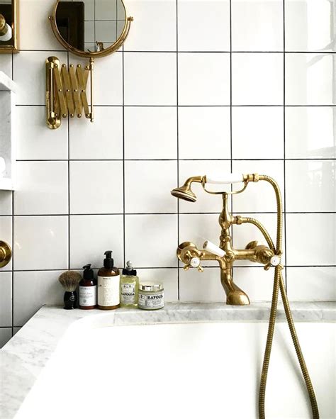Modern gold and brass fixtures for the bathroom. Design Crush: Brushed Gold Bathroom Fixtures - LivvyLand ...