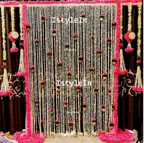 Download the perfect flowers pictures. White tuberose n pink marigold artificial garlands ...