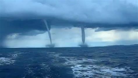 Beautifully Terrifying Twin Water Spouts Blow Across The Ocean Youtube