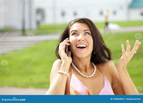 happy woman talking on cell phone stock image image of caucasian outdoor 34606893