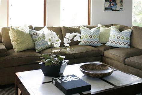 Thinking About How To Bring Bold Lively Colors To An Olive Couch