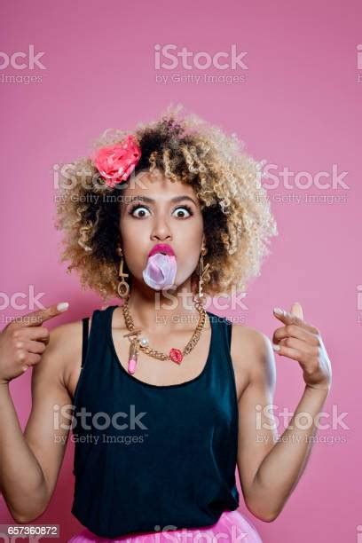 Cute Afro Woman Blowing Bubble Gum Stock Photo Download Image Now