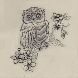 Cute Little Owl Sitting On Flowered Tree Branch Tattoo Design