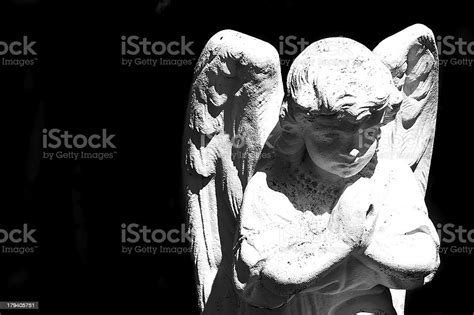 Beautiful Statue Of The Angel Praying Stock Photo Download Image Now