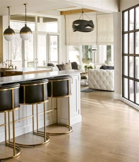 Burnished to bright, golden tones will sit beautifully against this strong green shade from dinnerware on the table to decorative accessories in the living room. Black and Gold Kitchen Decor Beautiful Black and Gold Home ...
