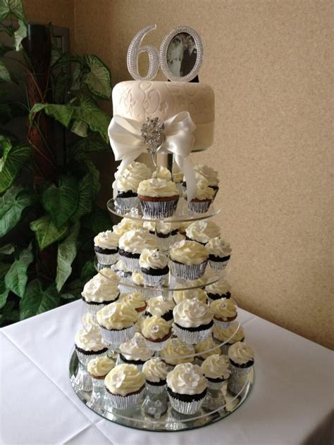 Sep 15, 2020 · by all means get a wedding cake (a small one, or a larger one you can freeze the layers of), but you might find an alternative more social and enjoyable. 60th wedding anniversary cake and cupcakes - Google Search ...