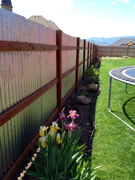 It resists rust and mold and has a long lifespan. corrugated metal fence update - noelle o designs