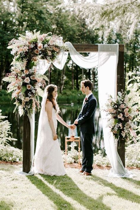 Gorgeous Floral And White Drapery Wedding Arch Ideas Emmalovesweddings