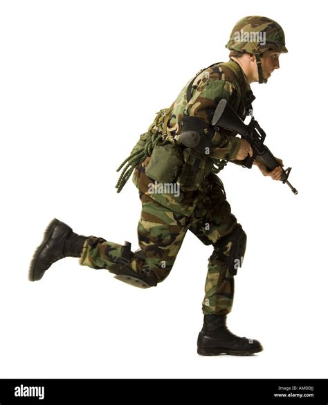 Soldier In Uniform With Gun Running Stock Photo Royalty Free Image