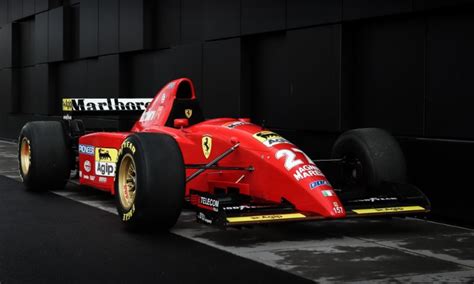 Only the world champion is allowed to use number 1. Schumacher's first Ferrari F1 car for sale - Automotive Blog