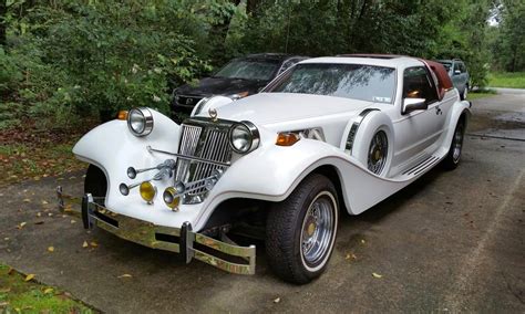 This replica is titled as a 1988. Pick of the Day is a kit car based on a 1988 Mercury Cougar