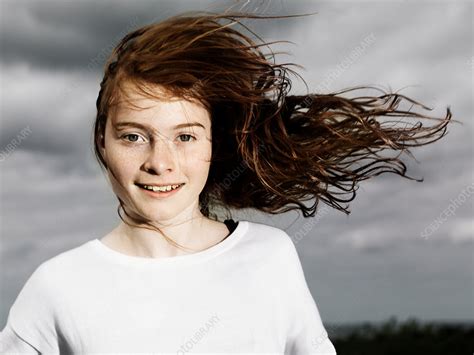 girls hair blowing in wind outdoors stock image f005 3349 science photo library