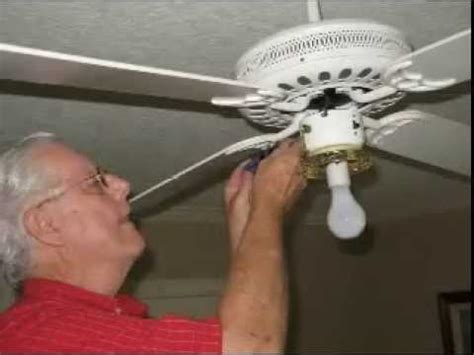 With a manual screwdriver, turn out the screws holding the removable lower section from the ceiling fan motor base. Ceiling Fan Light Repair - YouTube