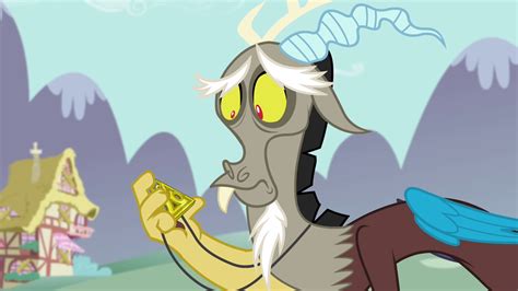 Image Discord Looking At The Medallion S4e26png My Little Pony