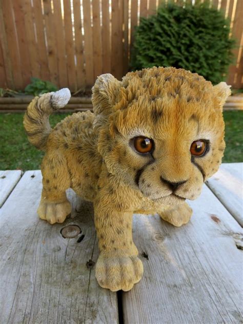 Baby Cheetah Playing Figurine