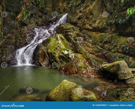 Beautiful Silky Smooth Waterfall Stream In The Rainforest Sabah