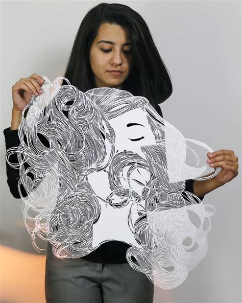 Paper Art Indian Artist Hand Cuts Different Hairstyles On Sheets Of Paper