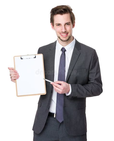 Happy Smiling Young Business Man Showing Blank Clipboard Stock Photo