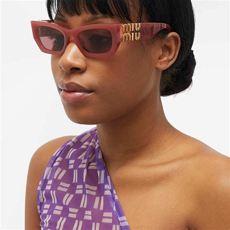 Miu Miu Eyewear Womens 09ws Sunglasses In Cognac Opal Miu Miu