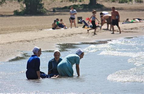 Amish Girls At The Beach Photograph By Mb Matthews Pixels