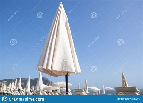 Folded Umbrella On The Beach Stock Image Image Of Shore Protection