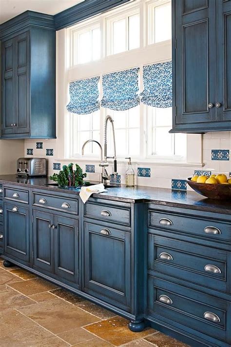 Applicator options for repainting include spraying, rolling or brushing with either a natural or synthetic bristle brush or a foam brush. 20 Beautiful Kitchen Cabinet Colors - A Blissful Nest