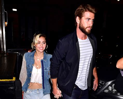 miley wears engagement ring from liam hemsworth on “malibu” cover