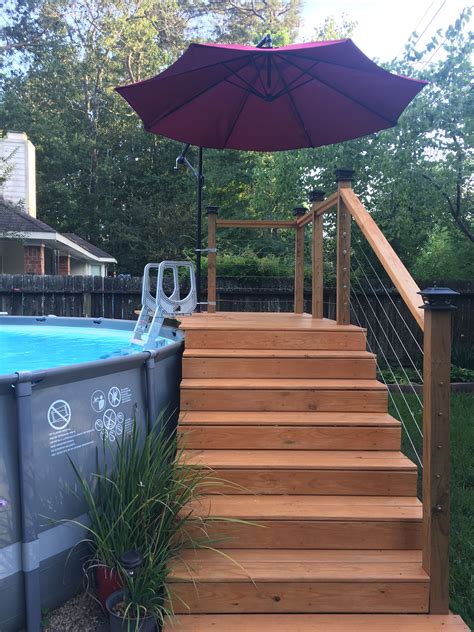 They should not be attached to the pool for stability the pool is essentially just adjacent to the deck. DIY Above Ground Pool Deck | Above ground pool landscaping ...