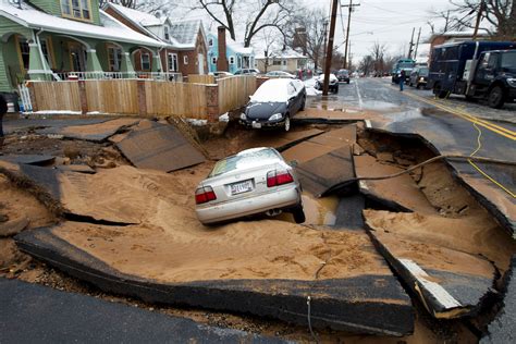 Sinkhole Swallows Car In Suburban Dc Picture Incredible Sinkholes
