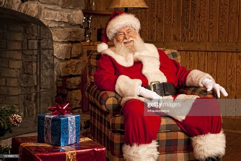 Pictures Of Real Santa Claus Relaxing At Home High Res Stock Photo