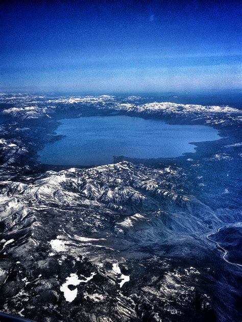 Aerial View Of Beautiful Lake Tahoe Surrounded By The Snow
